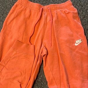 Orange Nike sweats